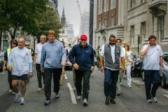Beefy walking in London street